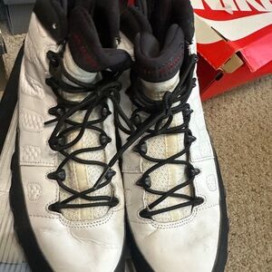 Air Jordan White and Black High-Top Sneakers